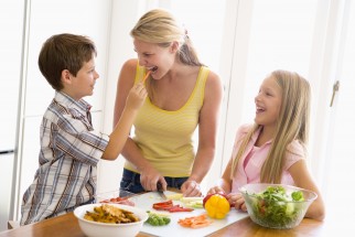 Mother And Children Prepare A meal,mealtime Together